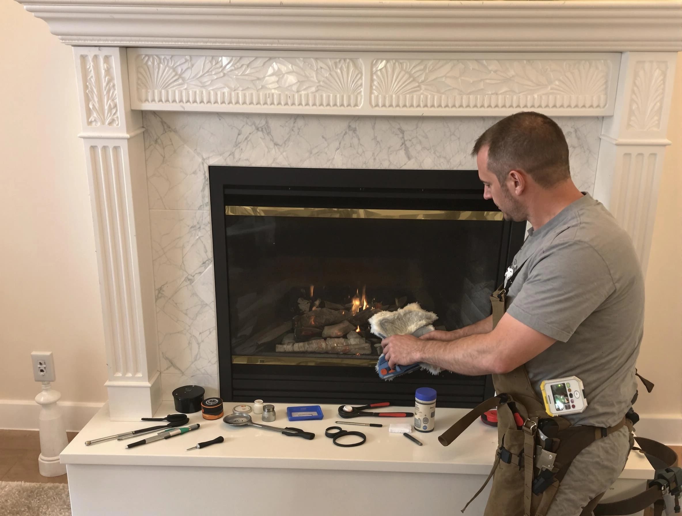 Orem Chimney Sweep performing fireplace maintenance in Orem, UT